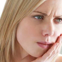 Почему может болеть зуб после лечения кариеса?
